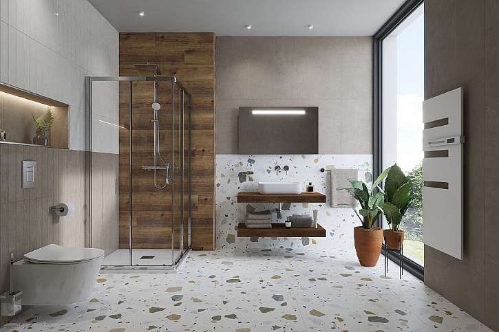 Výrazné terrazzo s prvky dřeva dodá prostorné koupelně šmrnc