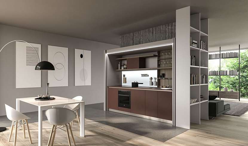 Systém vysokých skříní Phantastic, tak jak ho představila společnost ARAN Cucine, představuje elegantní řešení pro garsonky a malé byty.