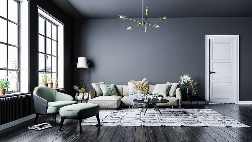 Chcete-li mít tmavě šedé stěny, dodáte místnosti na zajímavosti tím, že prostor doplníte šedým nábytkem ve světlých tónech.