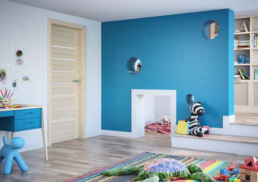 V chlapeckém pokoji kluky můžete kombinovat modrou s barevným kobercem a doplňky.